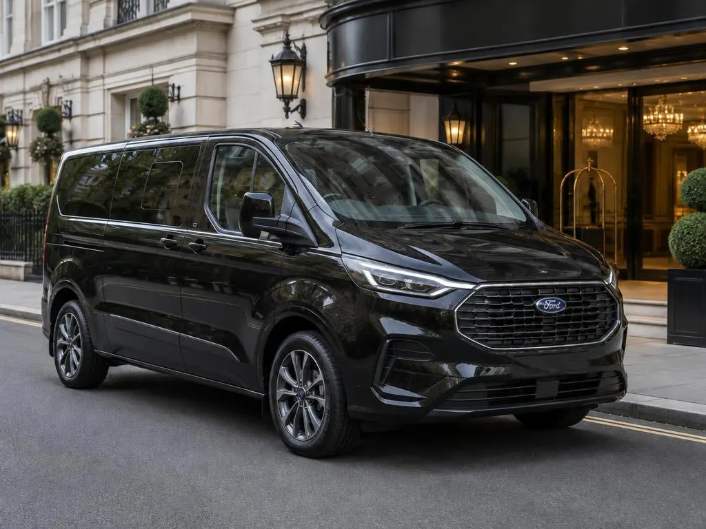 Black Ford Tourneo Custom chauffeur vehicle outside a London hotel